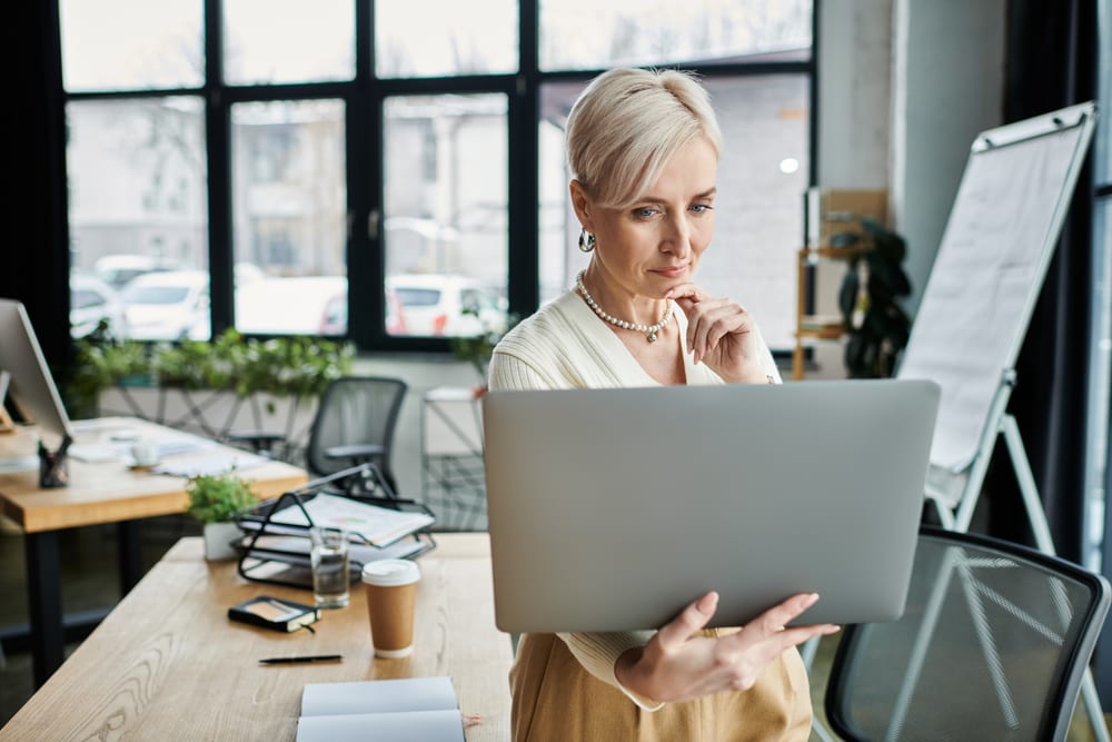 Business professional evaluating Zoho One as a Dynamics 365 alternative