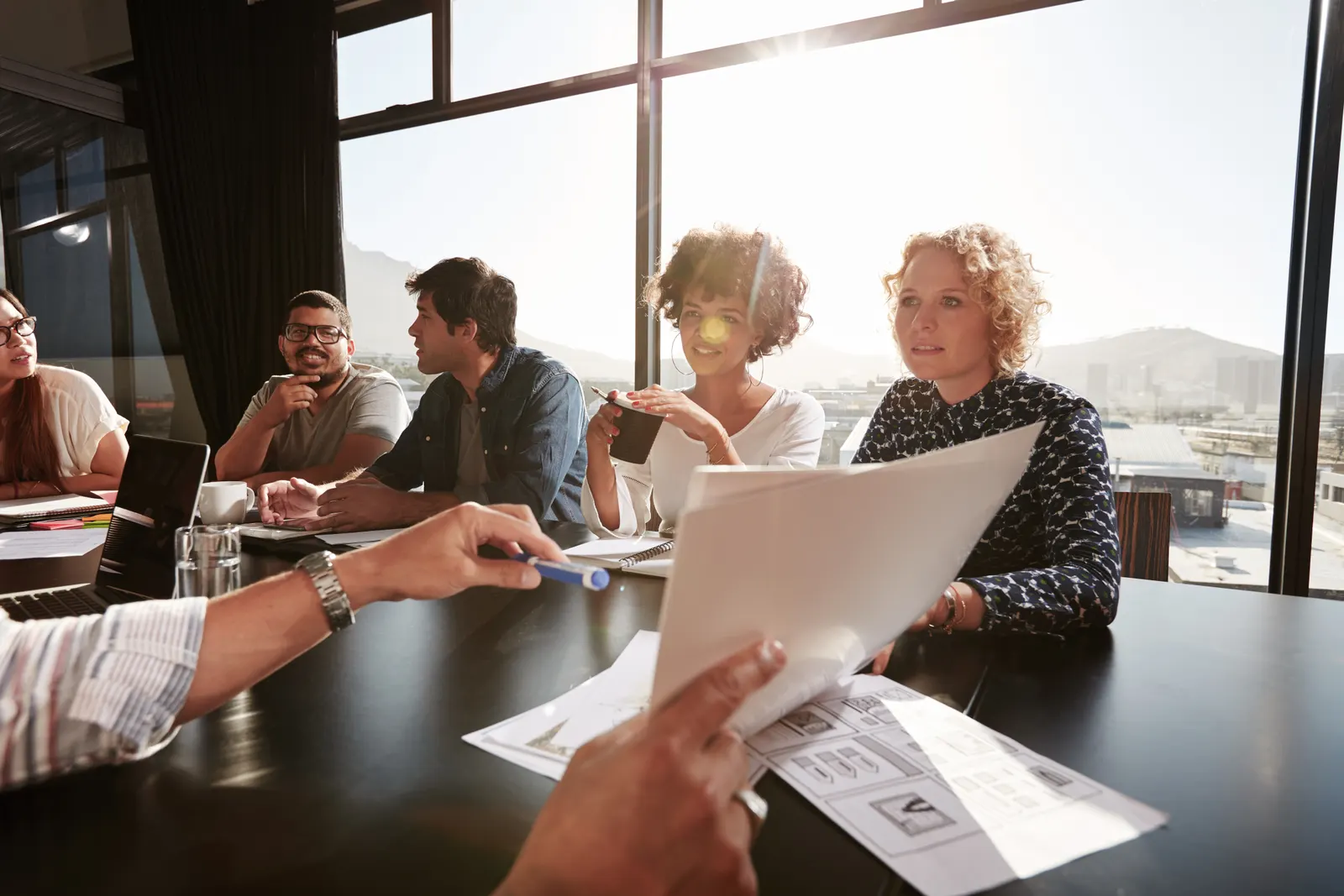 Team reviewing a documented brand positioning framework in a meeting
