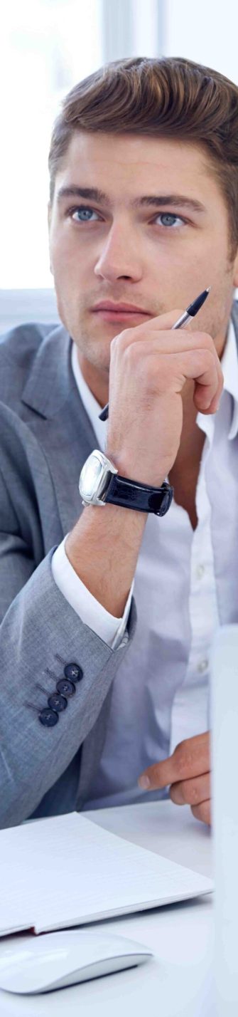 Coming up with inspiring corporate ideas. A thoughtful young businessman at his desk